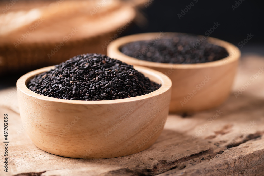 Black sesame seeds in a bowl on wooden, Still Life Black sesame seeds in a bowl on wooden, Still Life