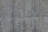 Reinforced concrete with crack. Grungy reinforced concrete wall with crack, high resolution background texture.
