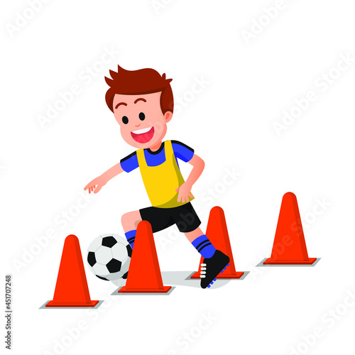 a cheerful boy practicing soccer with several cones
