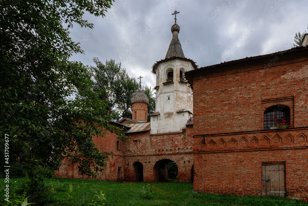 View of the Church of St. Michael the Archangel and the Church of the Annunciation of the Most Holy Theotokos on a cloudy summer day, Veliky Novgorod, Novgorod region, Russia