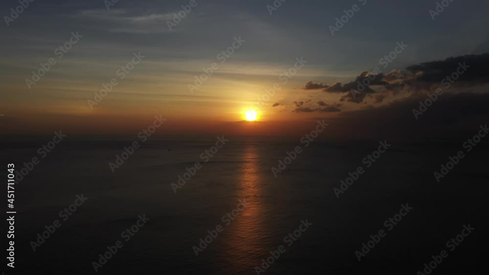Aerial view of drones in the sea, evening sunset, orange lights Aerial view of drones in the sea, evening sunset, orange lights
