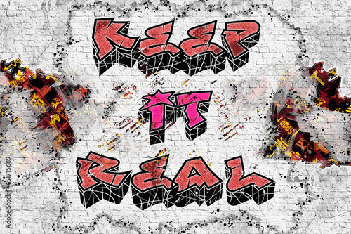 Illustration. Graffiti - style inscription on a brick wall - Keep it real photo