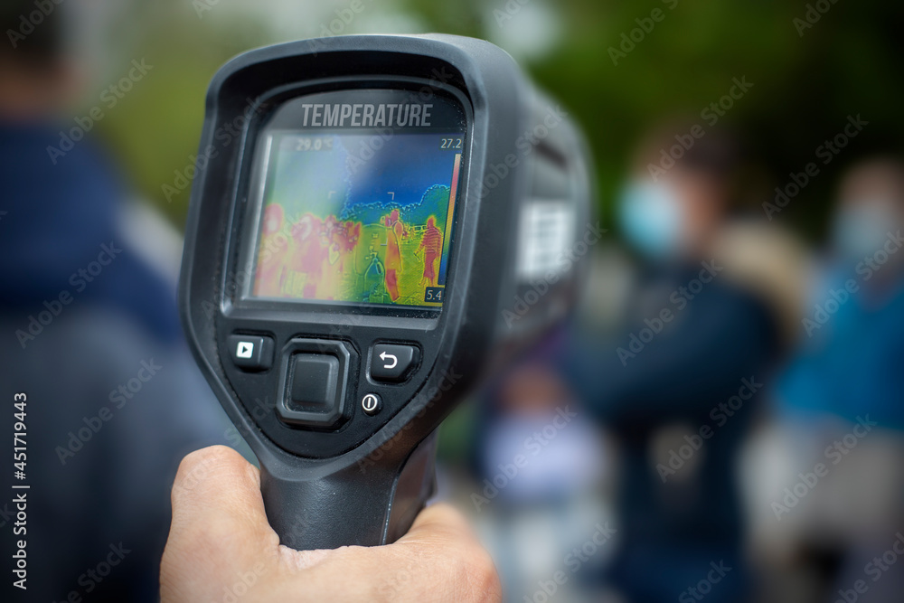 temperature taking with infrared thermometer, state-of-the-art technology.