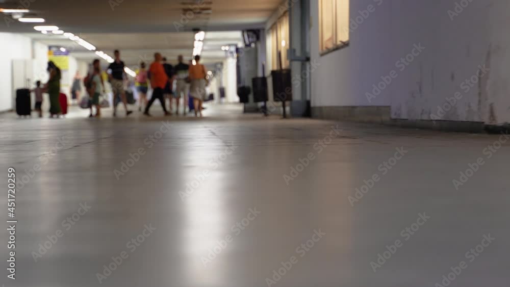 Passengers Changing Platforms in an Underpass To Catch the Train, Stabilized. Passengers Changing Platforms in an Underpass To Catch the Train, Stabilized.