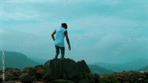 businessman on the top of the mountain