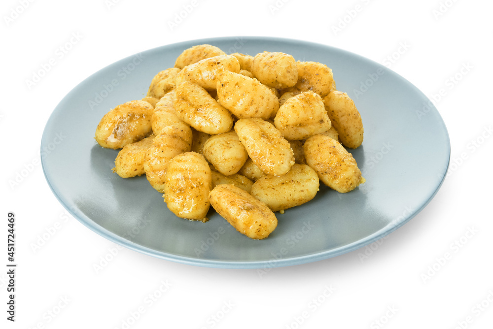 Plate with tasty pesto gnocchi on white background Plate with tasty pesto gnocchi on white background