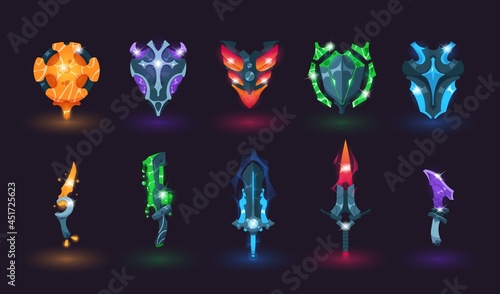Game swords and shields. Cartoon various magic blades with fire or poison effects. Fairy tale armor for action mobile gaming. Shiny playing arms template. Vector isolated weapon set