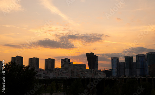 City silhouette against the sky on a sunset