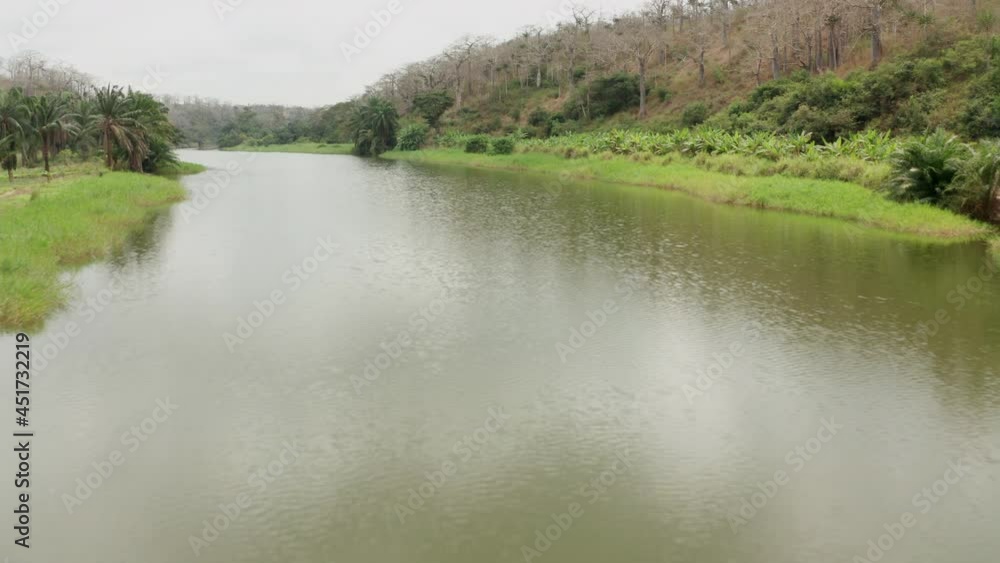 Traveling front over a river, dam on a river in Angola, Africa 3