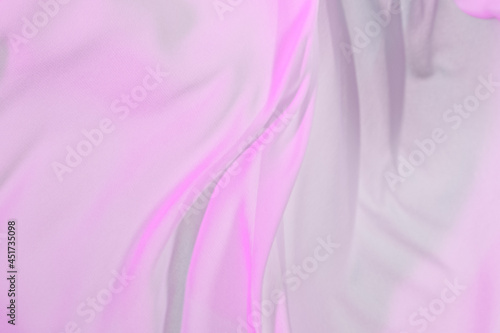 Smooth elegant colorful transparent cloth separated on white background. Texture of flying fabric.