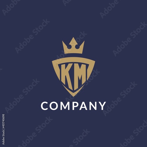 KM logo with shield and crown, monogram initial logo style