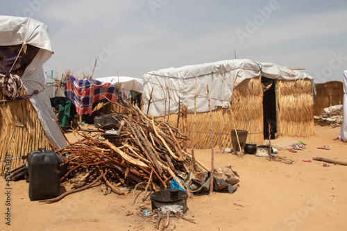 Refugee camp (IDP - Internal displaced persons) taking refuge from armed conflict between opposition groups and government. Very poor living conditions, lack of water, hygiene, shelter and food photo