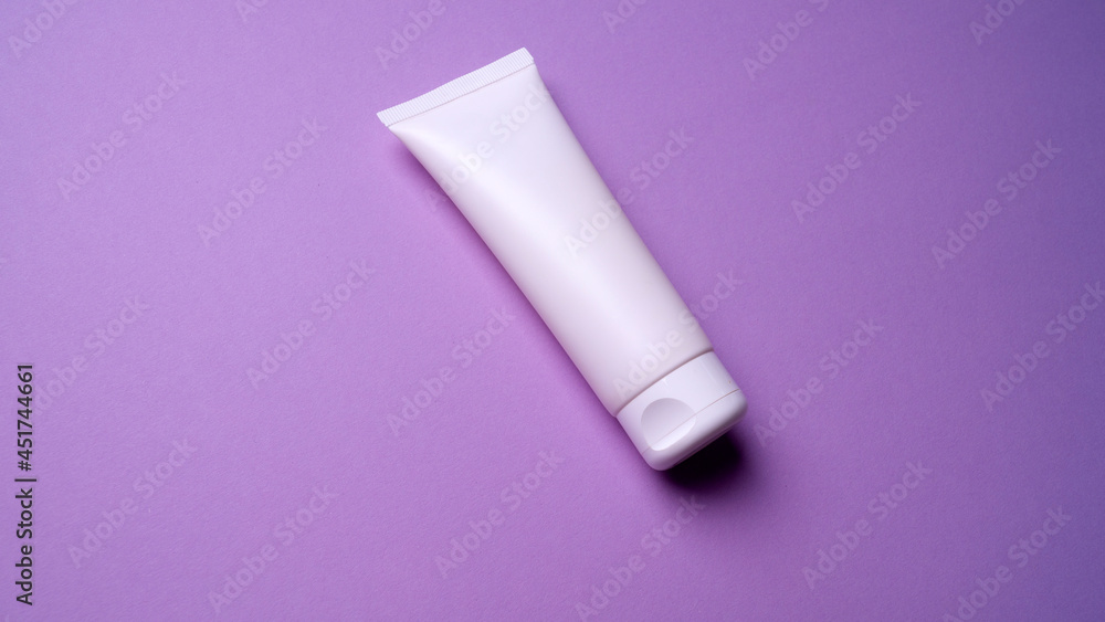packaging of hand or face cream on pink background packaging of hand or face cream on pink background