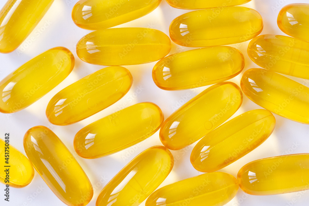 Flat lay of vitamin omega 3 in capsule, fish oil with empty space Flat lay of vitamin omega 3 in capsule, fish oil with empty space