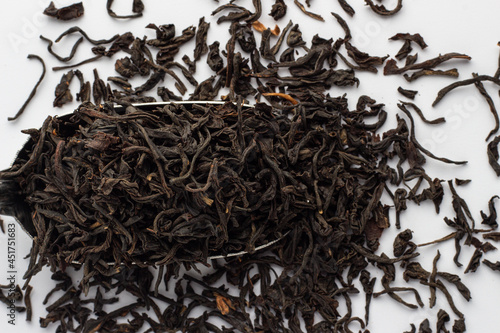 Dried Assam black tea leaves.