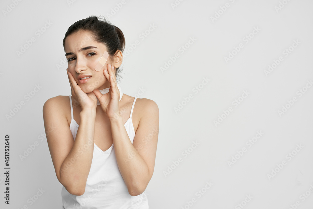 woman with head pain bandage around her neck health problems migraine woman with head pain bandage around her neck health problems migraine