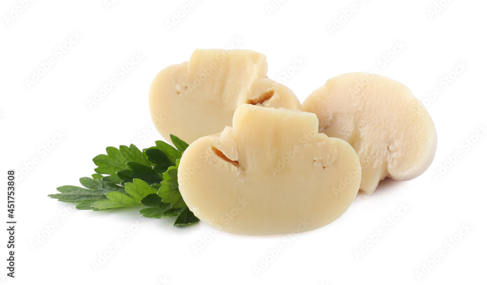 Fototapeta premium Cut marinated mushrooms and parsley isolated on white