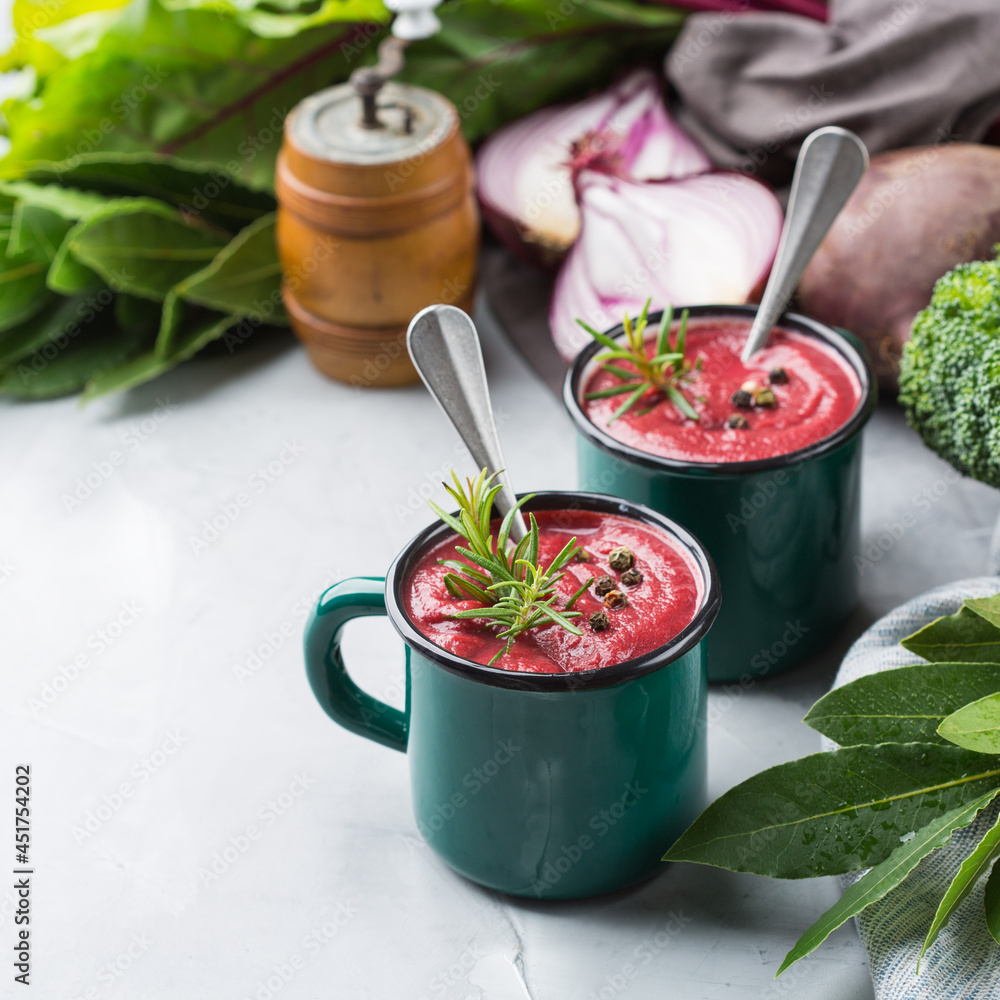 Seasonal fall autumn creamy beetroot soup on a table Seasonal fall autumn creamy beetroot soup on a table