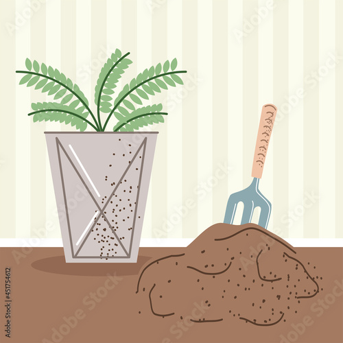 houseplant with rake tool