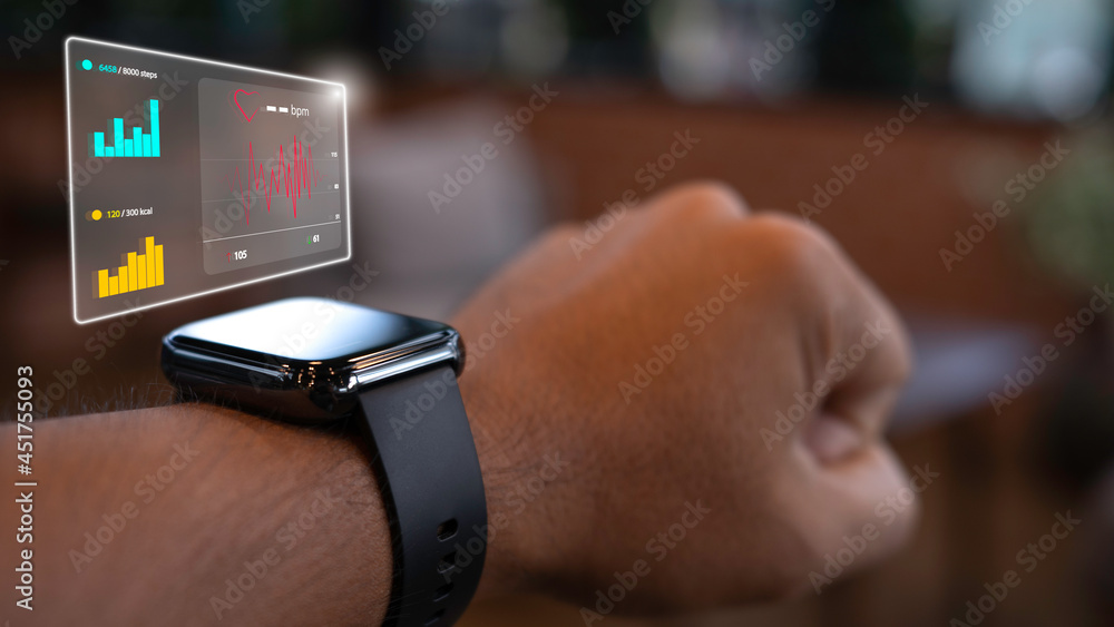 Close up smart watch on the wrist of a man who is exercising tells