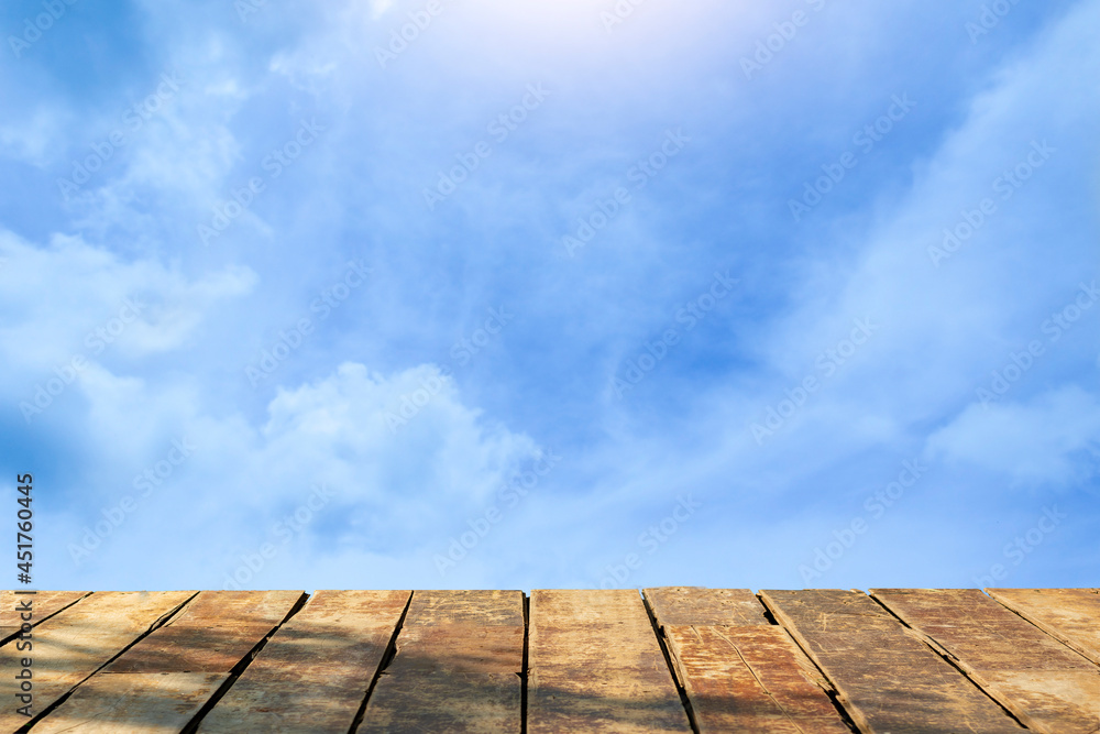 Beautiful wooden floor and blue sky background	