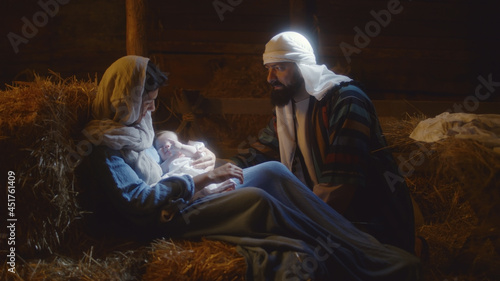 Fotografering Joseph speaking with Mary after birth of Jesus