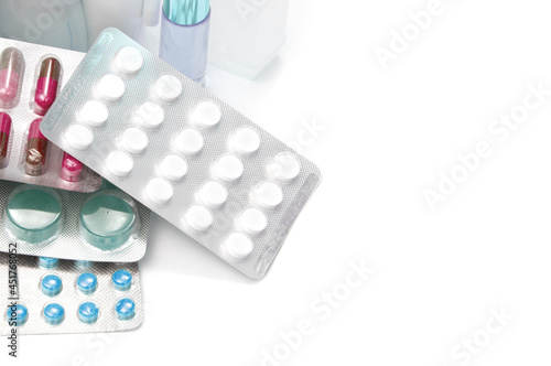 Pills with medicines on a white background