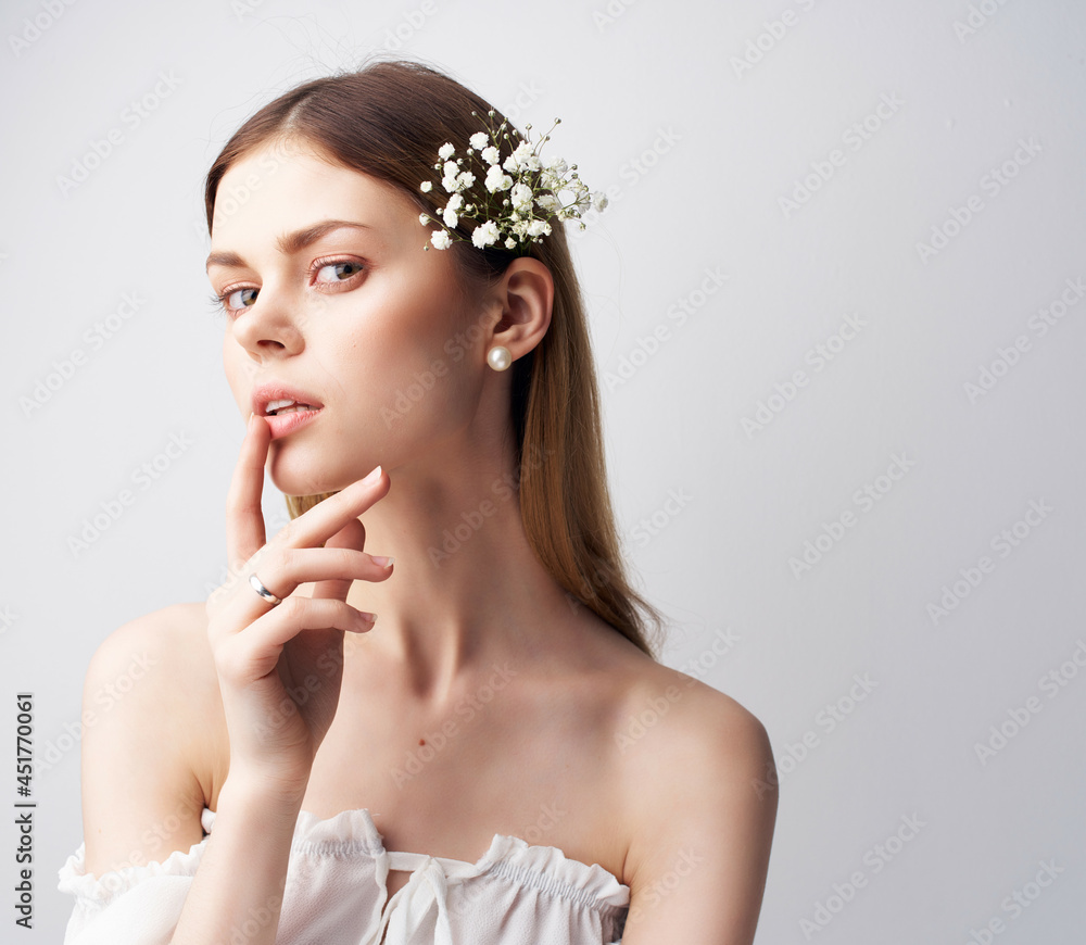 Fototapeta premium pretty woman bright makeup White dress light background