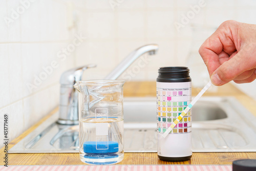 Checking tap water photo