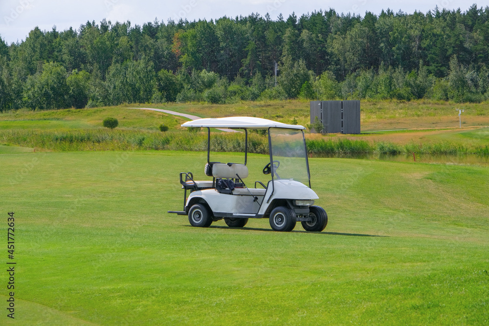 golf car in the summer in the field