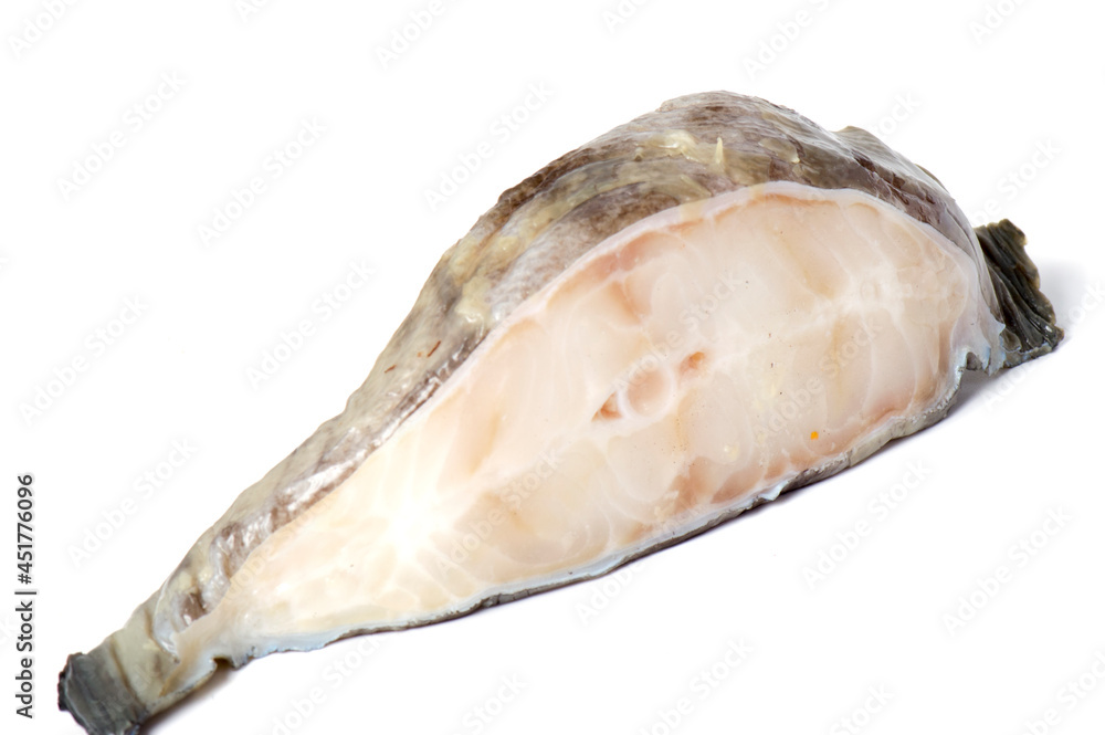 Naklejka premium Tasty raw salmon steak isolated on white. Raw fish steak, cut out