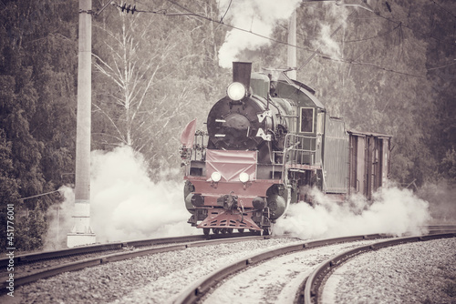 Retro steam train moves. Moscow region.