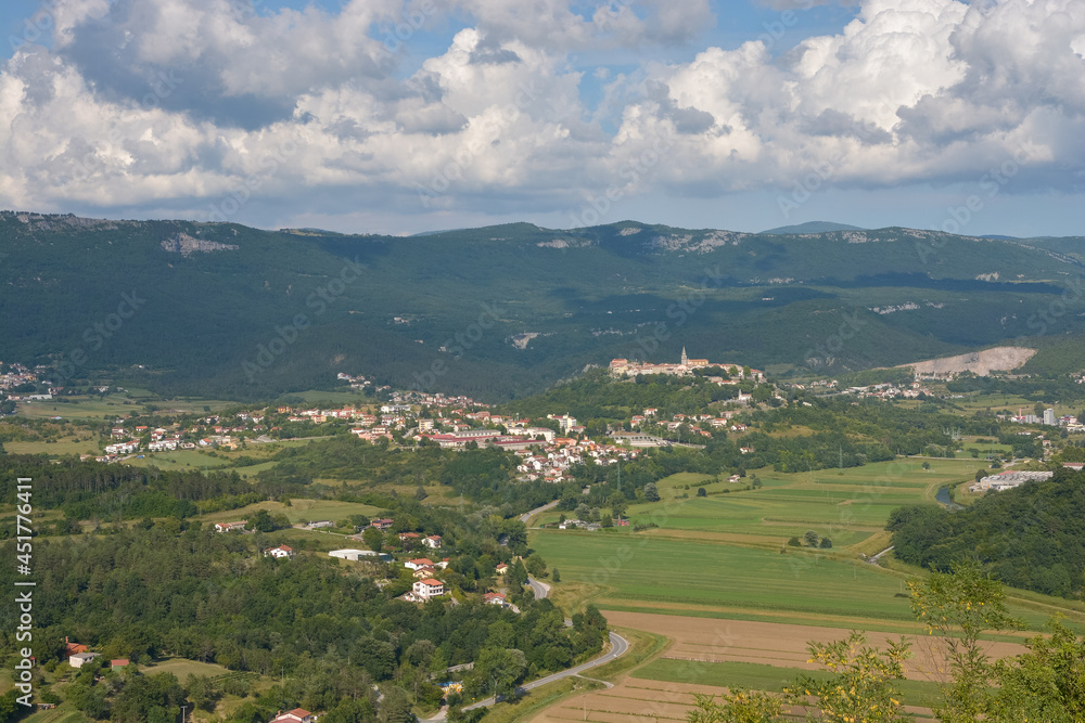 Panorama shot of the city of Buzet in Istria, Croatia, with green mountains