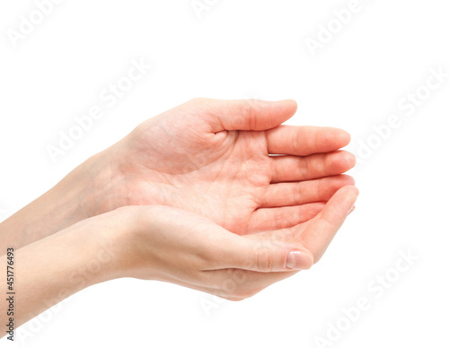 Close-up of beautiful woman's hands, palms up. Isolated on white background