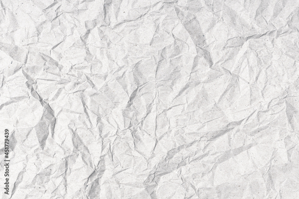 Gray Crumpled paper background texture. Full frame