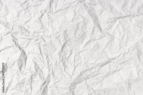 Gray Crumpled paper background texture. Full frame