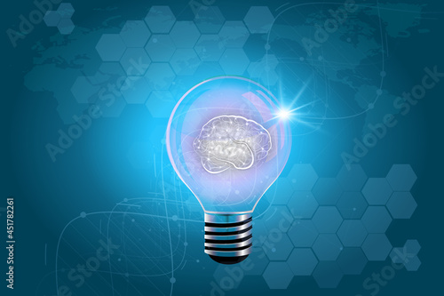 Glowing idea light bulb and innovation thinking creative concept on success inspiration blue map background 