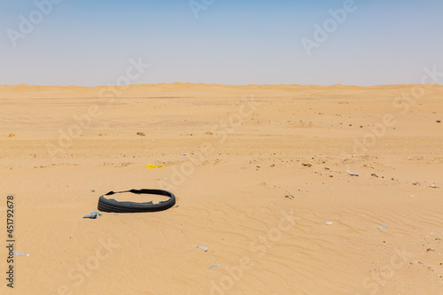 abandoned old tire in the vast desert in marib  yemen