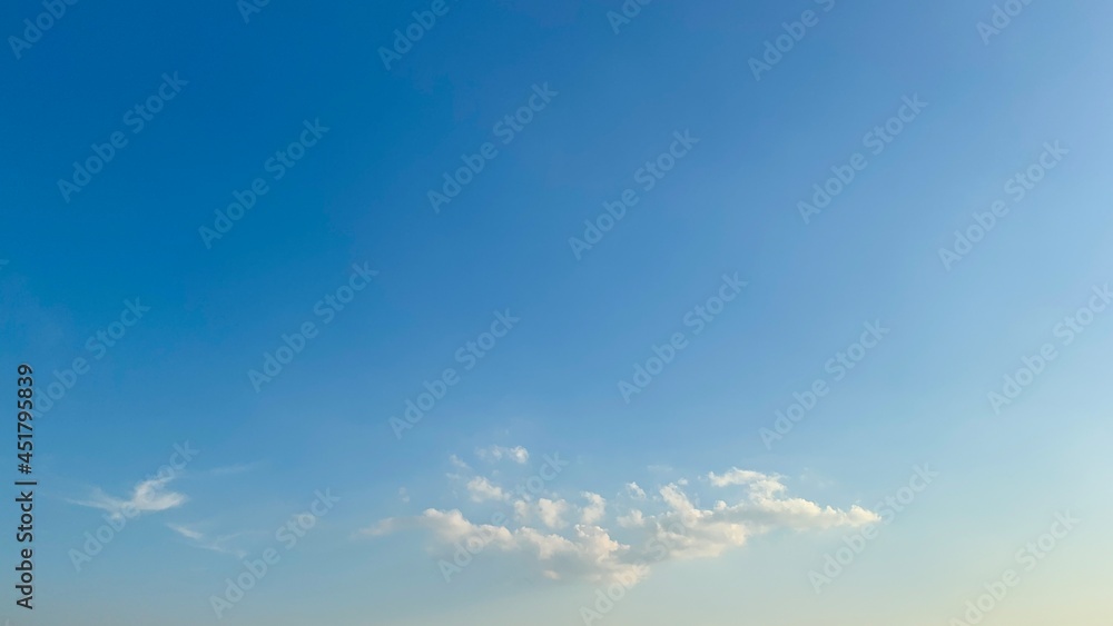 Clean Blue Sky background with cumulus white clouds,bright and light summer Clean Blue Sky background with cumulus white clouds,bright and light summer