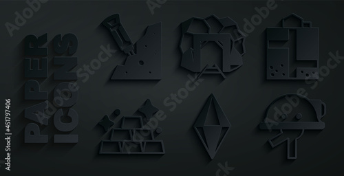 Fototapeta Naklejka Na Ścianę i Meble -  Set Gem stone, Mine entrance, Gold bars, Miner helmet, and Construction jackhammer icon. Vector