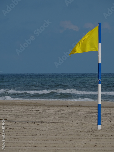 yellow beach flag