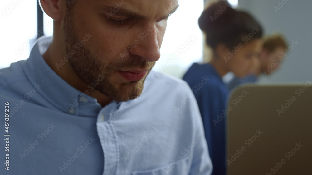 Businessman making notes in notebook at workplace. Entrepreneur writing schedule Businessman making notes in notebook at workplace. Entrepreneur writing schedule