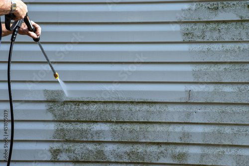 The vinyl siding is molded and slimy but a good power washing takes care of the problem nicely.