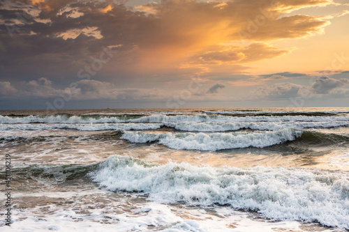 Charming sunset on the black sea beach in Georgia.