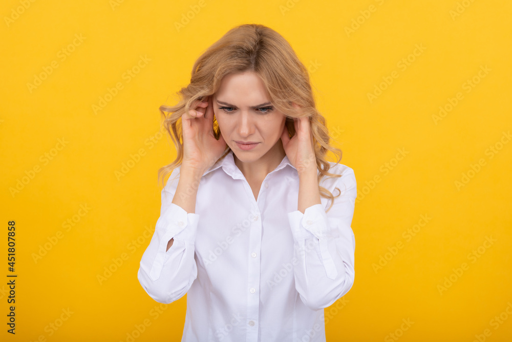 It is painful. Unhappy girl has pain in ears. Suffering from earache. Ear pain. headache. It is painful. Unhappy girl has pain in ears. Suffering from earache. Ear pain. headache.