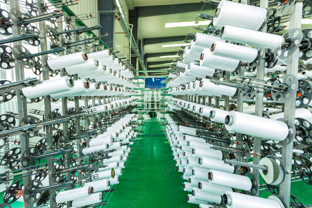 Fototapeta premium Packaging bag production workshop, A factory workshop where textile belts are produced