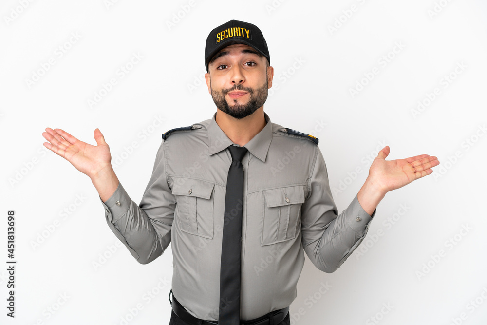 Young arab man isolated on white background having doubts while raising hands Young arab man isolated on white background having doubts while raising hands