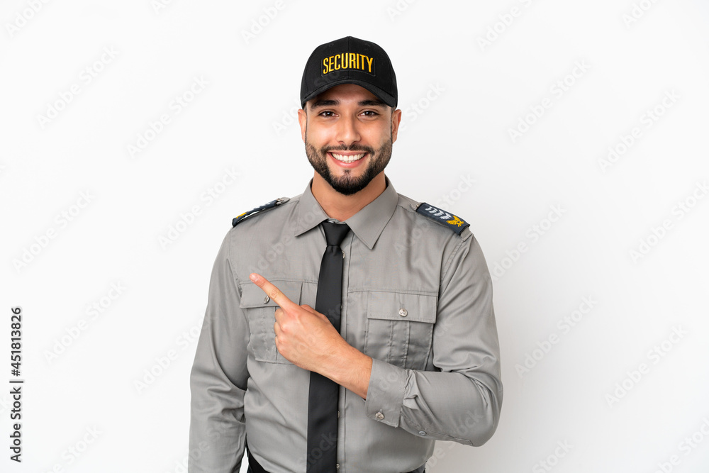 Young arab man isolated on white background pointing to the side to present a product