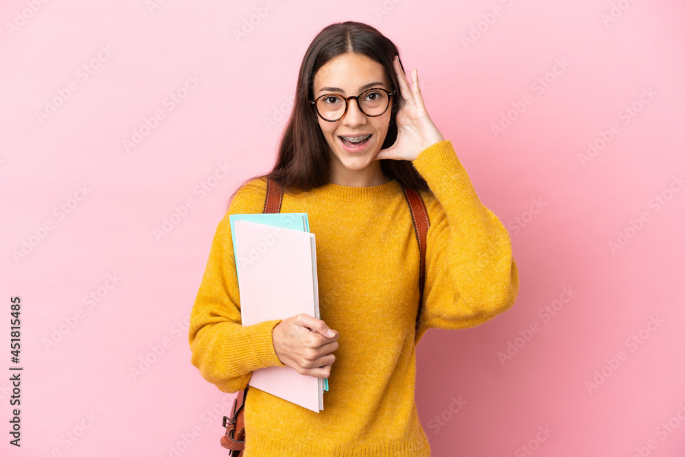 Young student woman over isolated background with surprise expression Young student woman over isolated background with surprise expression