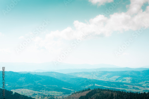 Fascinating panorama of sunset and landscape in the mountains on the hill, Ukrainian Carpathians mountains. Colored and their mountain landscapes. Nature concept